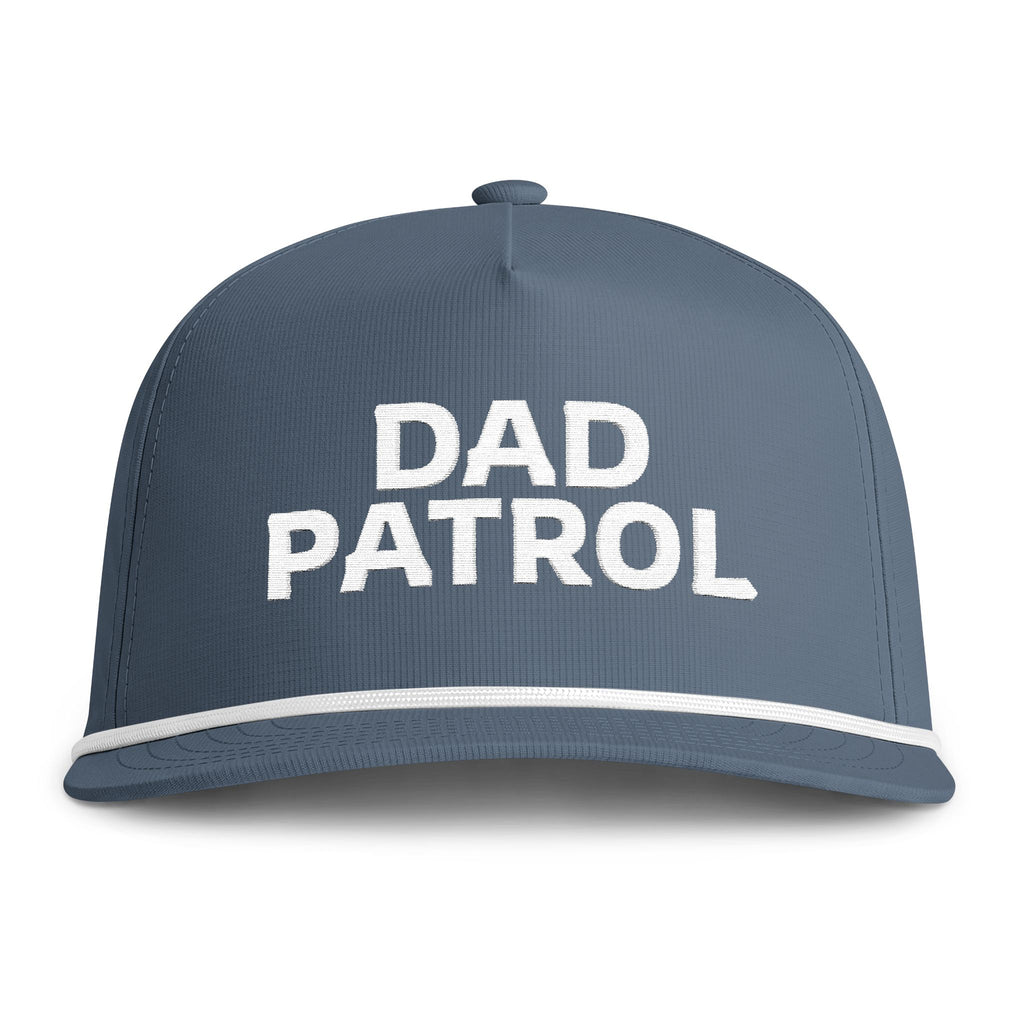 Image of an indigo hat with white embroidery reading "Dad Patrol"