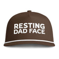 Image of an espresso hat with white embroidery reading "Resting Dad Face"