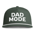 Image of a green hat with white embroidery reading "Dad Mode"