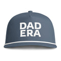 Image of an indigo hat with white embroidery reading "Dad Era"