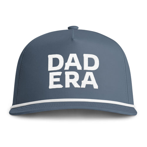 Image of an indigo hat with white embroidery reading "Dad Era"