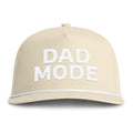 Image of an ivory hat with white embroidery reading "Dad Mode"