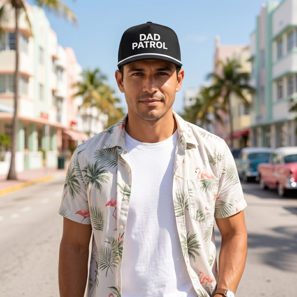 Image of a man wearing a black cap with "Dad Patrol" embroidery 